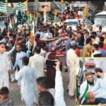 Haleem leads boat rally in connection with Youm Istehsal-e-Kashmir