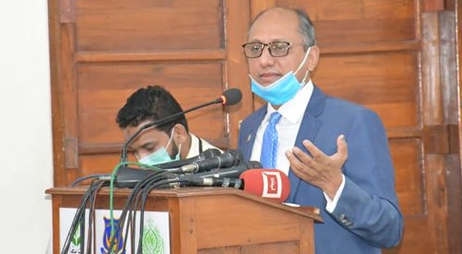 Saeed Ghani is addressing a function at NJV