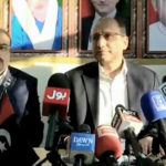 Saeed Ghani is addressing a press conference in London