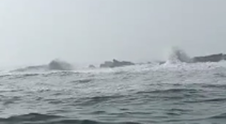 Island surfaces in the sea near Kund Malir coast
