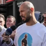 Andrew Tate detained as police raid homes in Romania