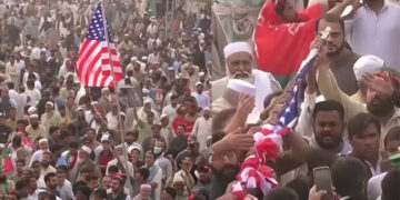 PTI Worker to Face Legal Action for Waving US Flag at Swabi Rally