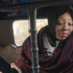 US woman chaos in moving ambulance