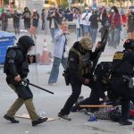 LA police order immigration protesters in downtown to go home
