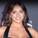 Tate McRae stuns at the F1 Movie Premiere.