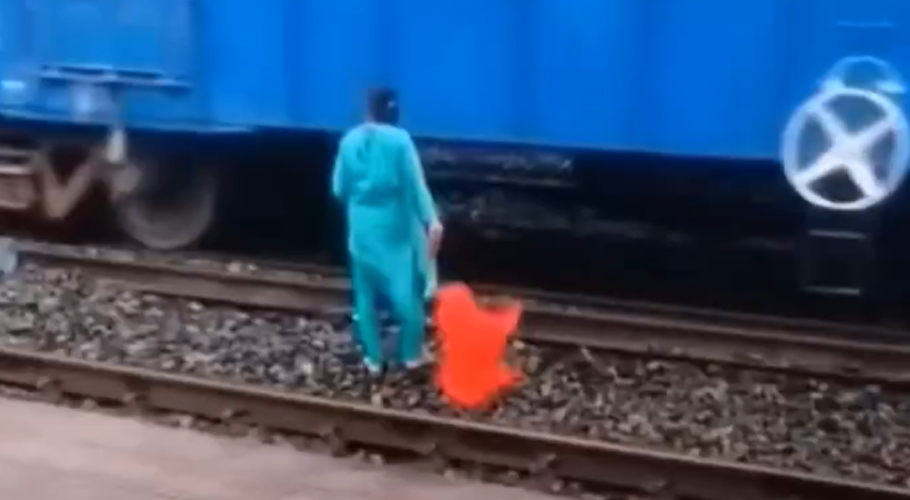 Cameraman Saves Woman Attempting Suicide