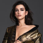 Dua Lipa dazzles in gold corset on onset of Canada leg of Radical Optimism tour