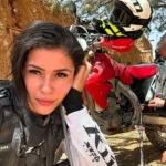Woman gang-raped by seven men in India continues her motorcycle world tour with husband