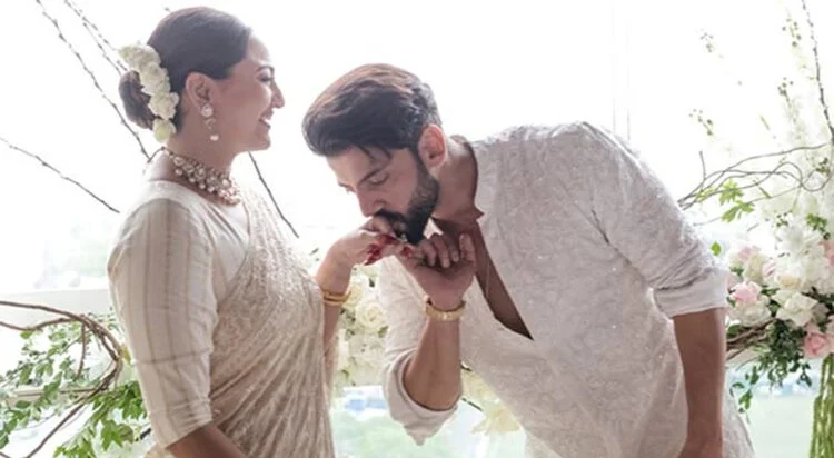 Zaheer reacts to Sonakshi’s pregnancy rumors by touching her stomach, video goes viral