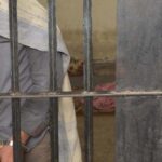 ملزم جیل کی سلاخوں کے پیچھے، فائل فوٹو